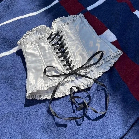 Victoria’s Secret silver corset with a crisscross ribbon backingWomen’s…